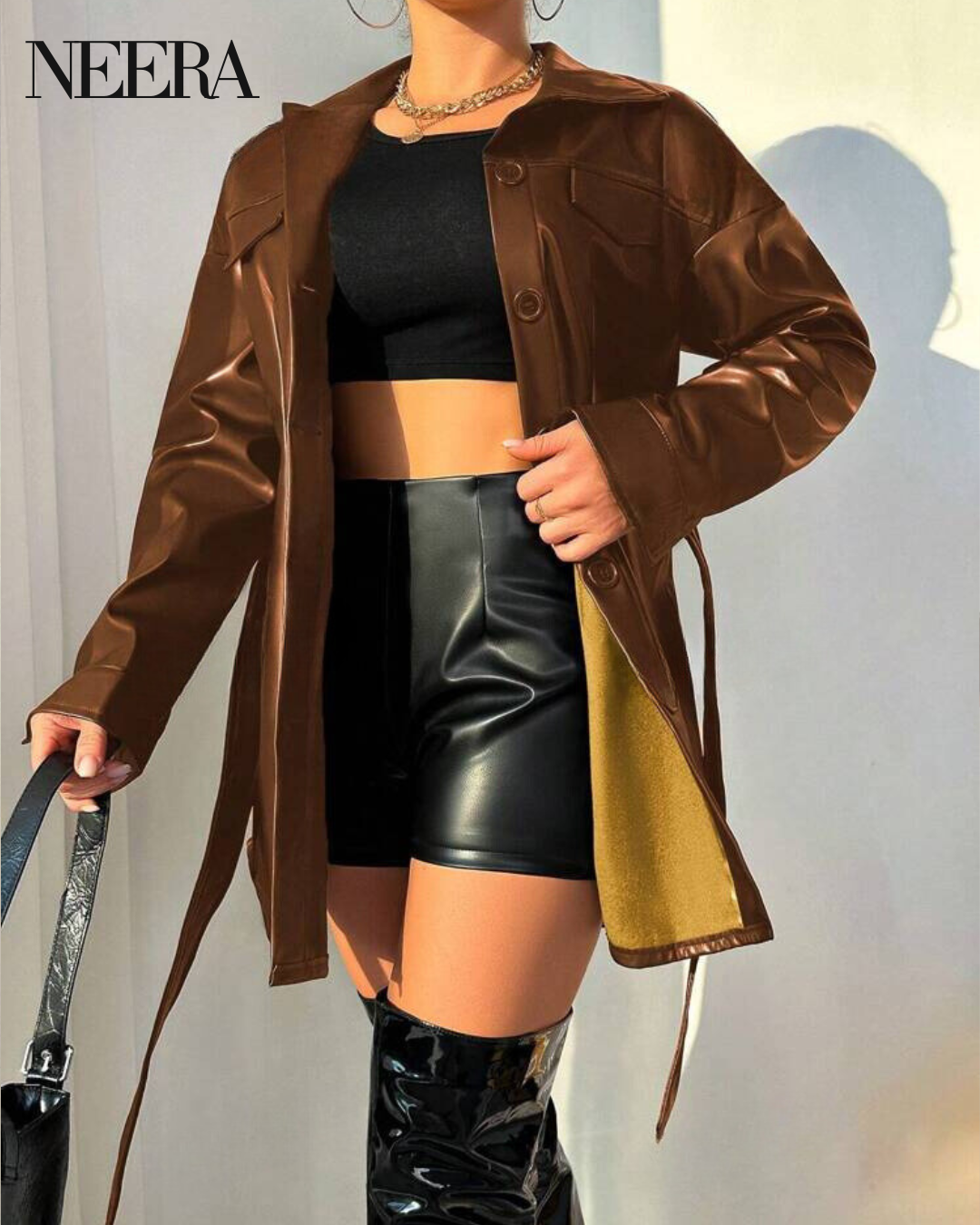 Leather coat with belt and flap detail