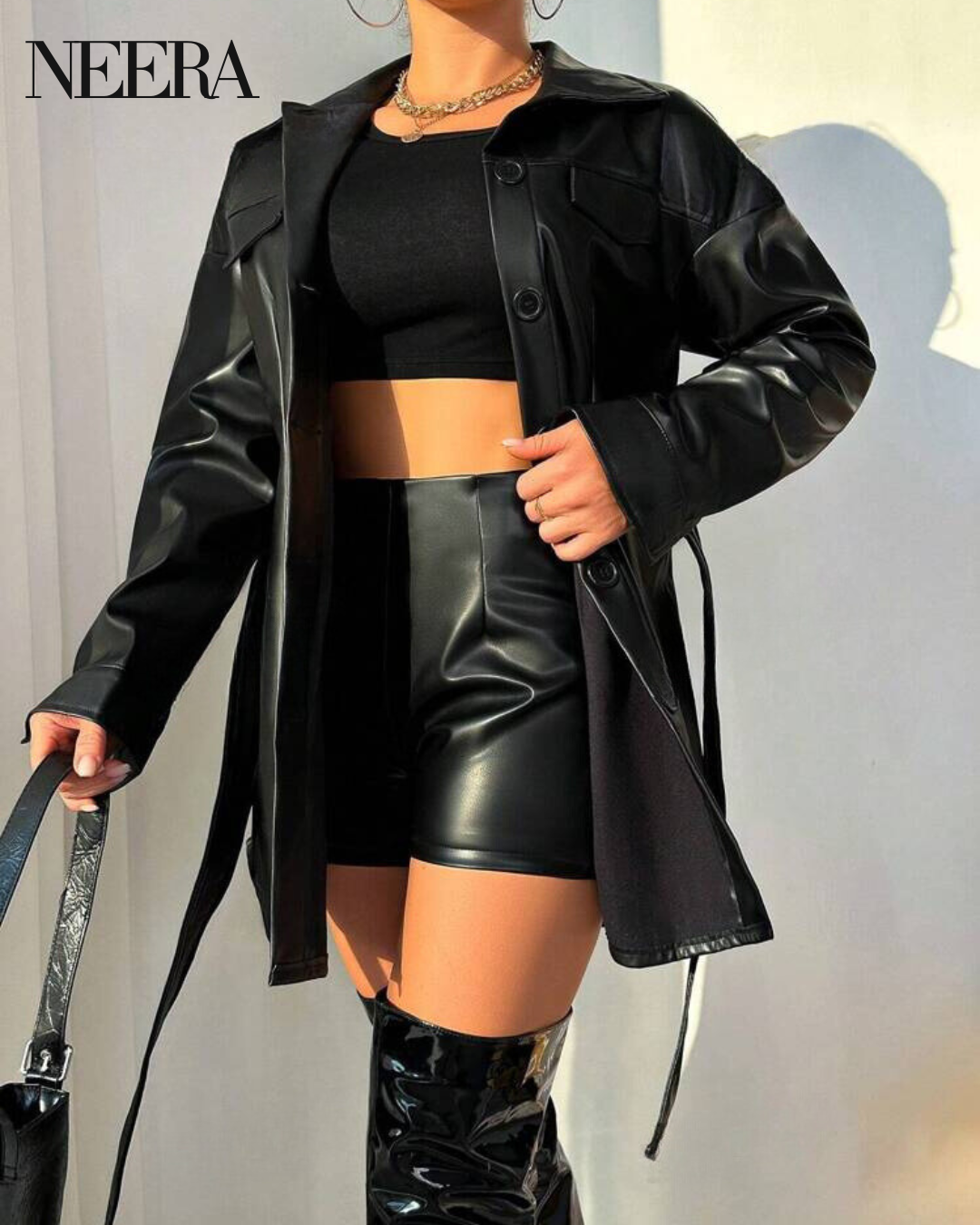 Leather coat with belt and flap detail